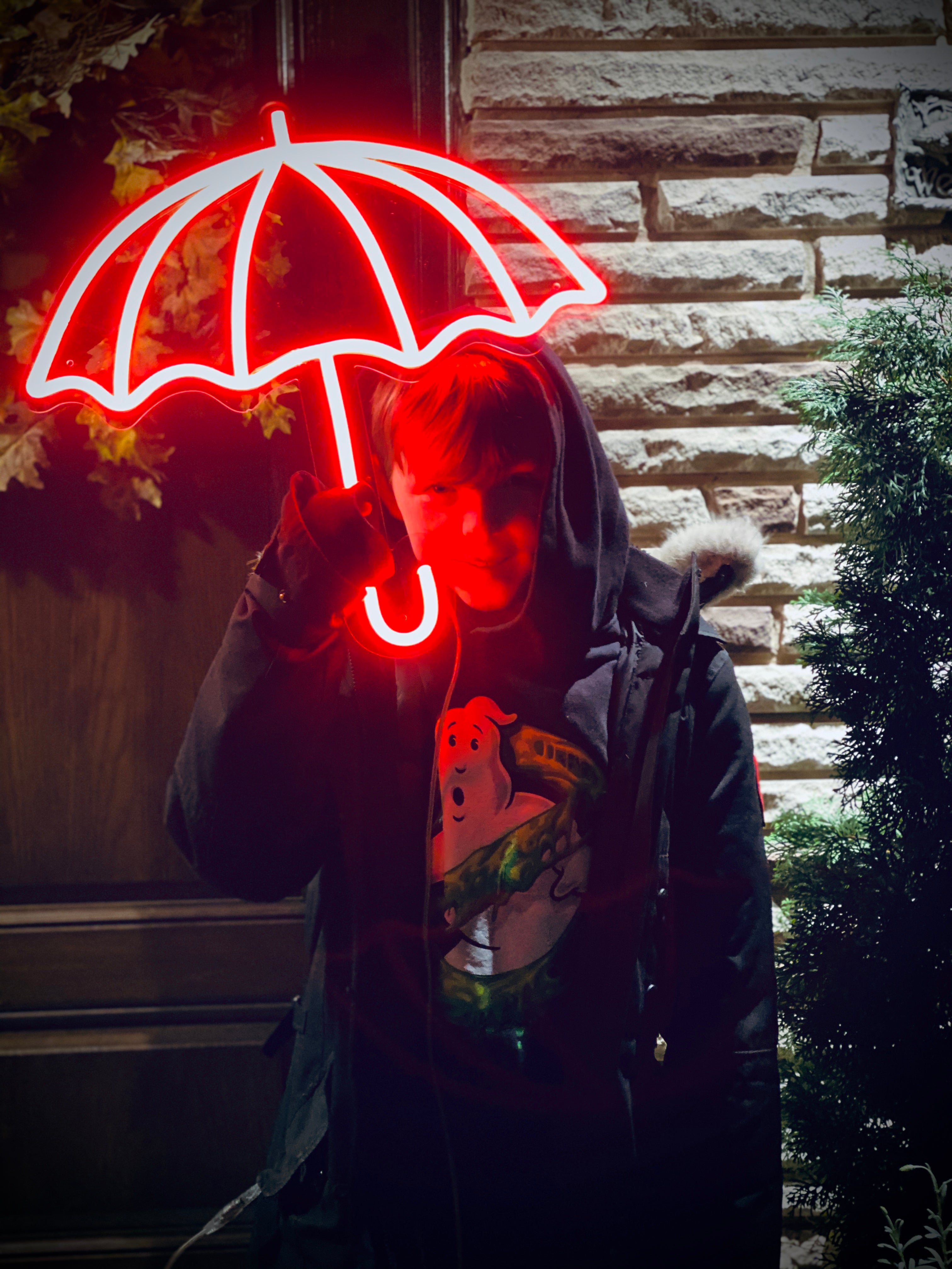 Neon Umbrella Sign Boy