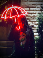 Neon Umbrella Sign Boy